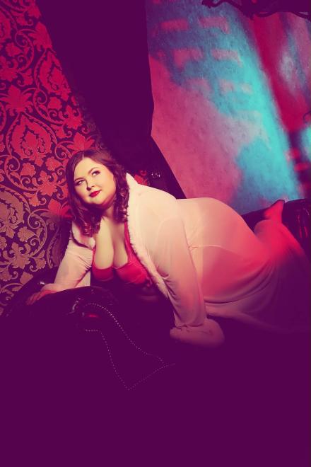 BBW webcam model Athena Witch poses on all fours on a photo shoot