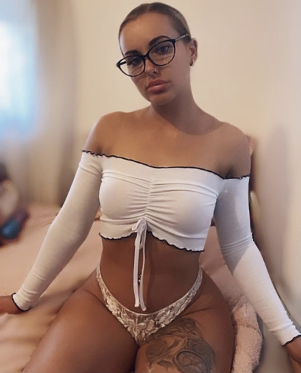 Blonde Lola Isadora babestation with her tied back wearing glasses