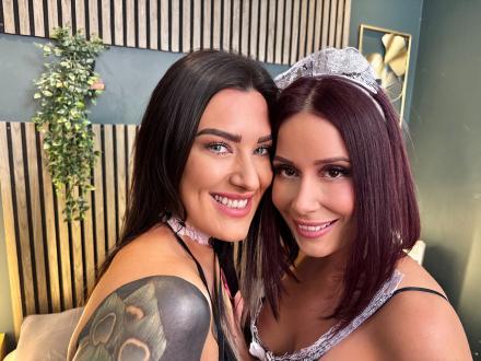 Belle O'Hara and Ginny Slayed smile into the camera Belle O'Hara and Ginny Slayed smile into the camera