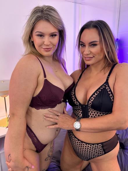 Delilah Jynx and Eva May posing in lingerie