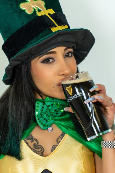 Alicia Sweets drinks a Guinness