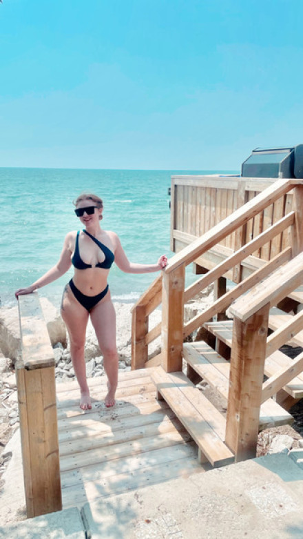 Lex enjoying the see against blue sea back drop